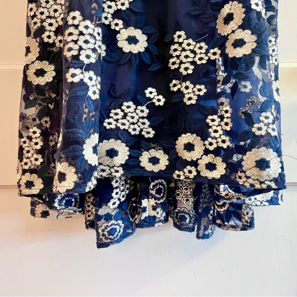 Tahari Elegant Sleeveless Dress with White Floral Embroidery over Deep Blue - Picture 5 of 14